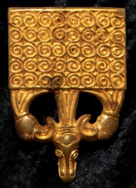 Thinplate decoration of scabbard in gold plated silver found in a sacrificial bog at Finnestorp near Falkøping