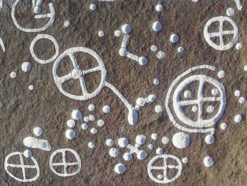 Petroglyphs with wheel cross at Lille Strandbygrd near Nylars on Bornholm