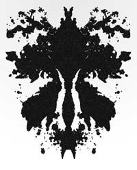 An ink blot looking like a female genitalia, orchid or microscopic aquatic animal
