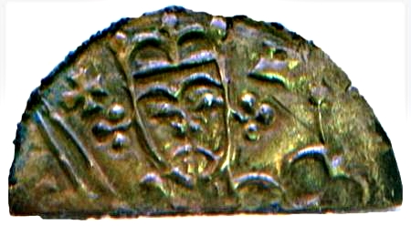 Part of a coin with a portrait of King Niels
