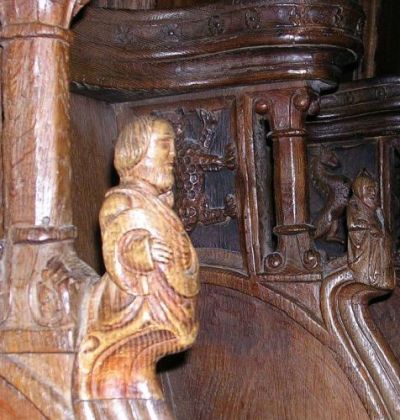 Carved figure on choir chair in Lund Cathedral from 1370