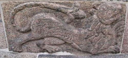 Stone lion in the wall of Viborg Cathedral