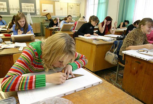 Serious and industrious girls in classroom