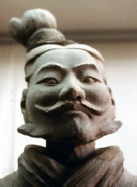 A terra cotta soldier with whiskers
