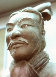 A terra cotta soldier with a mustache